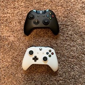 Two Xbox controllers